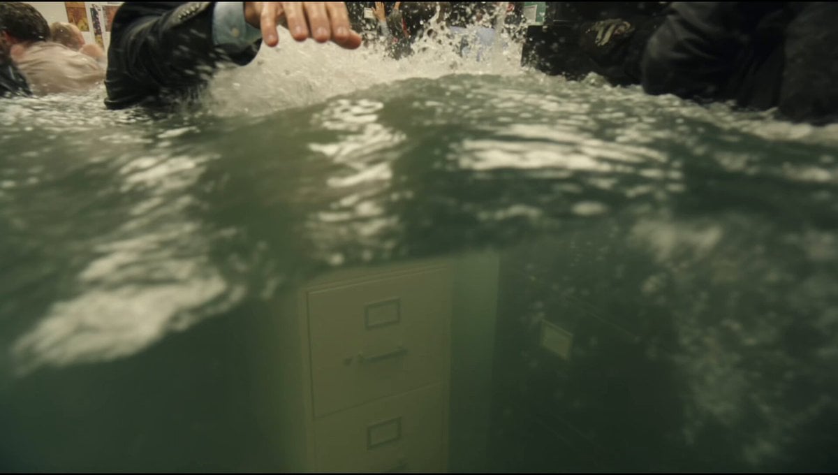 Slow-motion handheld close-up, 16:9. Shaky organic handheld shot tilting…